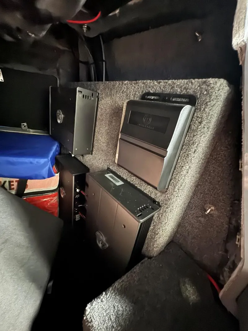 Slide: The Image of Interior view of 2022 Malibu Wakesetter 25 LSV showing audio equipment installation. - 39