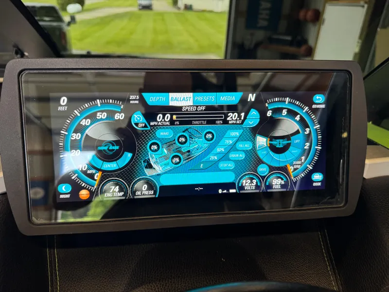 Slide: The Image of Dashboard of a 2016 Malibu Wakesetter 23 LSV boat with digital display. - 17