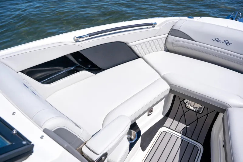 Slide: The Image of 2023 Sea Ray SLX 260 Outboard boat interior with luxurious seating and elegant design. - 39
