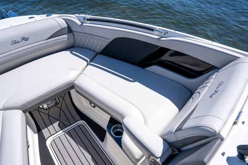 Slide: The Image of 2023 Sea Ray SLX 260 Outboard interior with luxurious seating and elegant design. - 42
