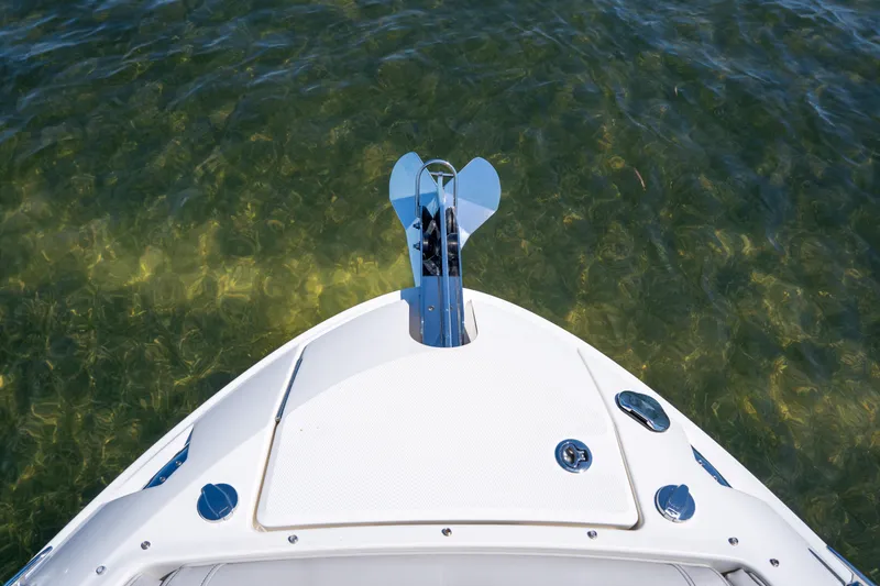 Slide: The Image of 2023 Sea Ray SLX 260 Outboard bow view on clear water. - 45