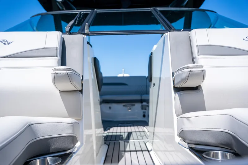 Slide: The Image of 2023 Sea Ray SLX 260 Outboard interior with sleek seating and modern design. - 48