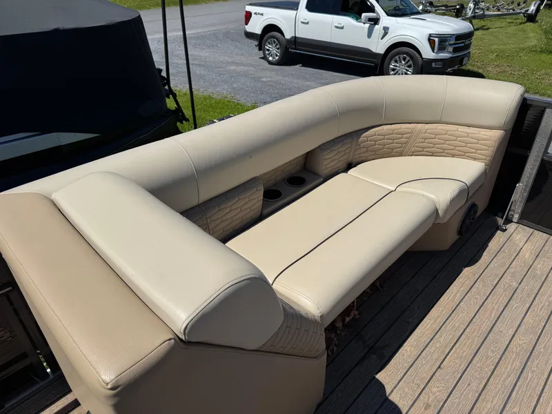 Slide: The Image of Luxurious seating on 2022 Montego Bay 8522 2PT BK DLX Fish & Cruise boat. - 12