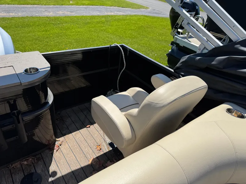 Slide: The Image of 2022 Montego Bay 8522 2PT BK DLX Fish & Cruise boat interior with beige seating. - 16