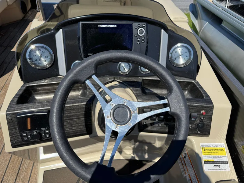 Slide: The Image of Steering console of 2022 Montego Bay 8522 2PT BK DLX Fish & Cruise boat. - 18