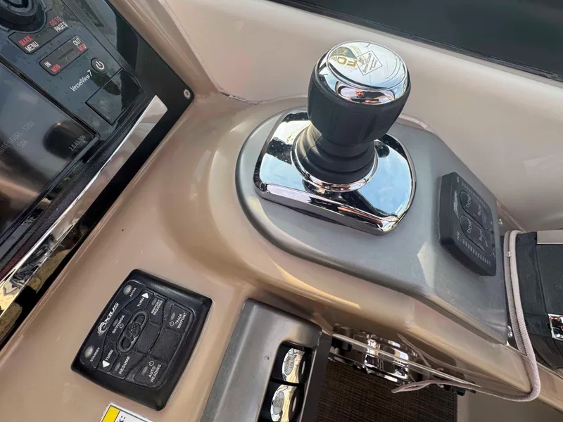 Slide: The Image of Control panel of 2015 Formula 350 Crossover Bowrider boat with joystick and buttons. - 14