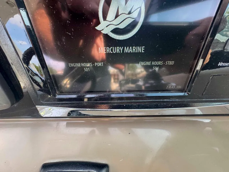 Slide: The Image of Control panel of a 2015 Formula 350 Crossover Bowrider showing Mercury Marine engine hours. - 15