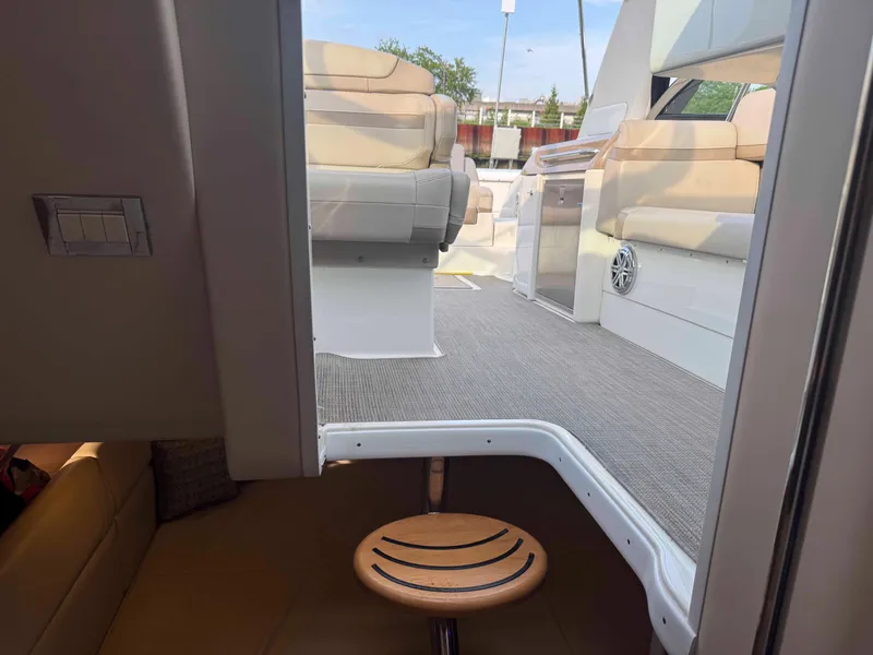 Slide: The Image of 2015 Formula 350 Crossover Bowrider interior with seating and step detail. - 25