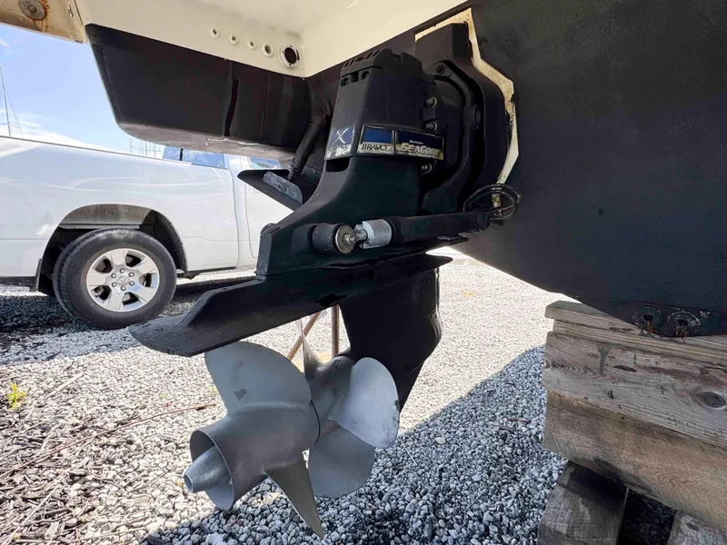 Slide: The Image of 2015 Formula 350 Crossover Bowrider boat propeller and outdrive on display. - 32