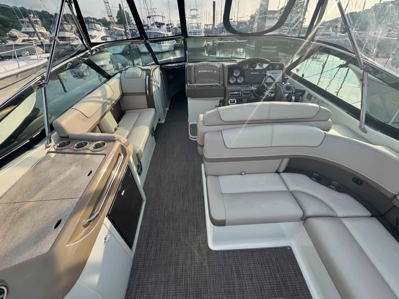 Slide: The Image of 2015 Formula 350 Crossover Bowrider interior with spacious seating and modern dashboard. - 7