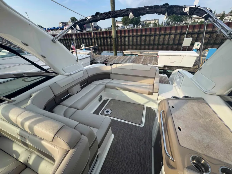 Slide: The Image of 2015 Formula 350 Crossover Bowrider interior with spacious seating and elegant design. - 8