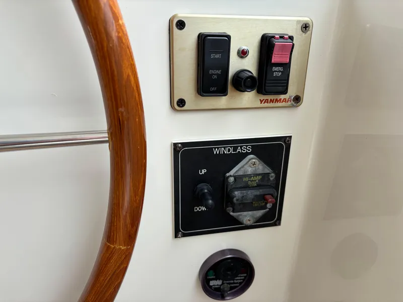 Slide: The Image of Control panel on 2006 MJM 34z Express HT boat with Yanmar and windlass controls. - 15