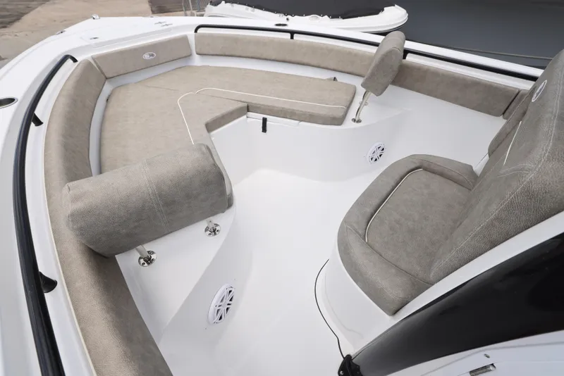 Slide: The Image of 2025 Sea Hunt Ultra 245 SE boat interior with cushioned seating and modern design. - 4