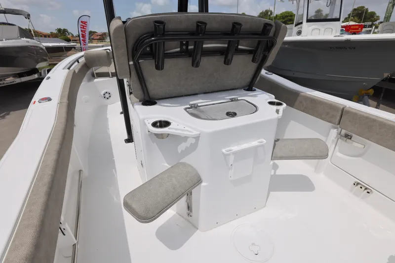Slide: The Image of 2025 Sea Hunt Ultra 245 SE boat interior with seating and storage features. - 9