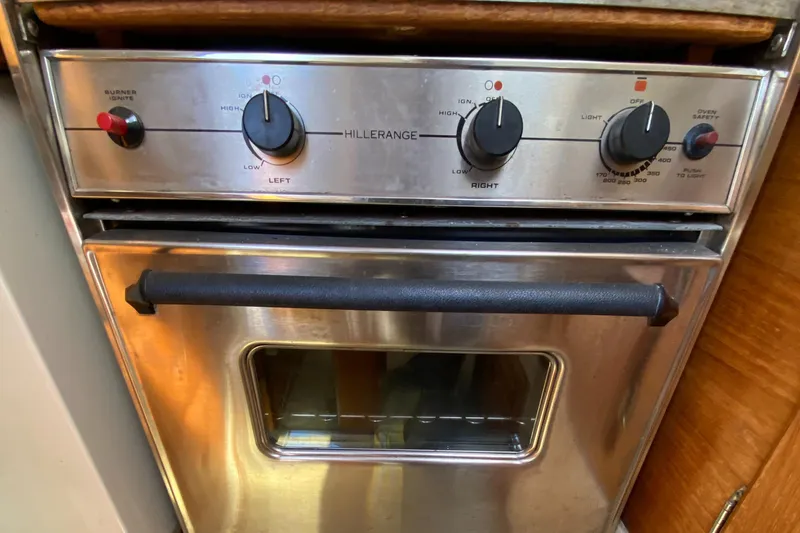 Slide: The Image of Stainless steel oven in a 1992 Catalina 30 MkII yacht kitchen. - 15