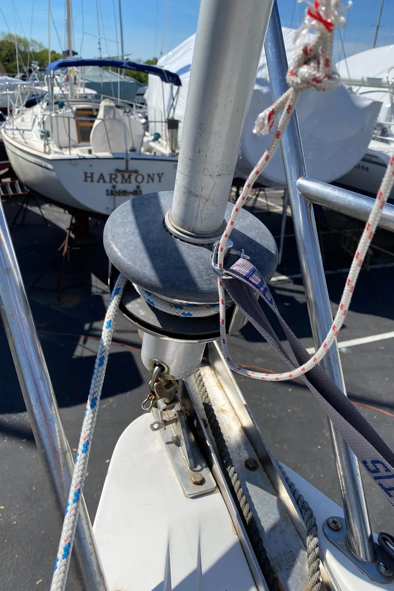 Slide: The Image of Close-up of a 1992 Catalina 30 MkII sailboat's bow with rigging and ropes. - 19