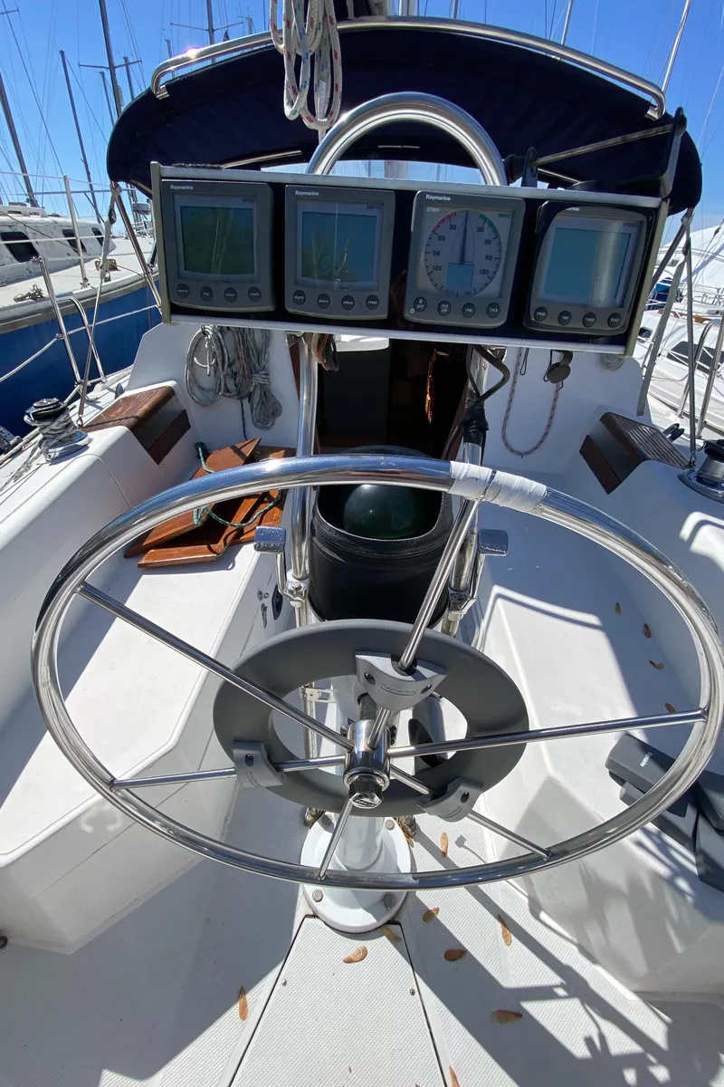 Slide: The Image of Steering wheel and instruments on a 1992 Catalina 30 MkII sailboat. - 8