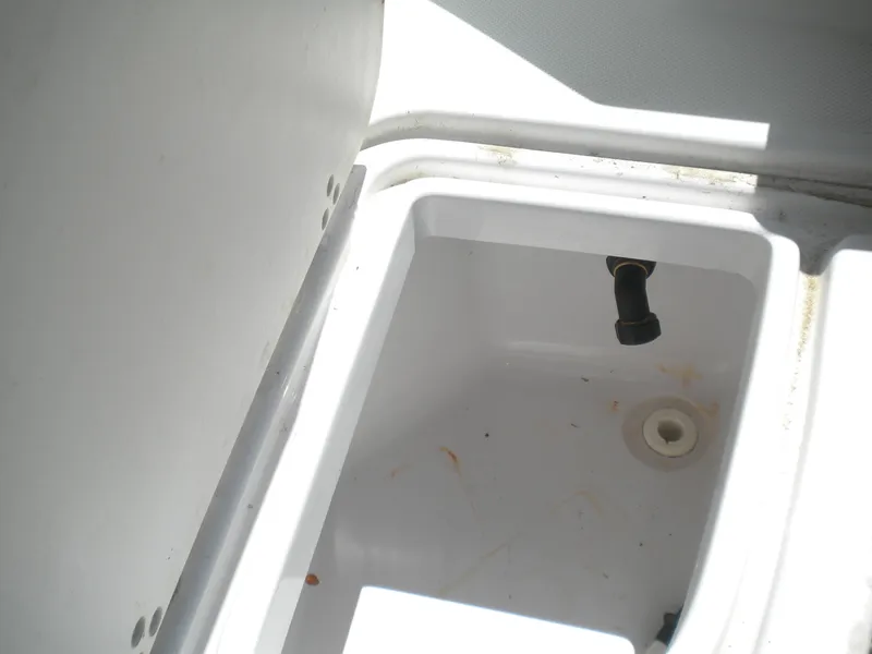 Slide: The Image of Livewell compartment in a 2003 Pro-Line 23 Walk boat. - 19