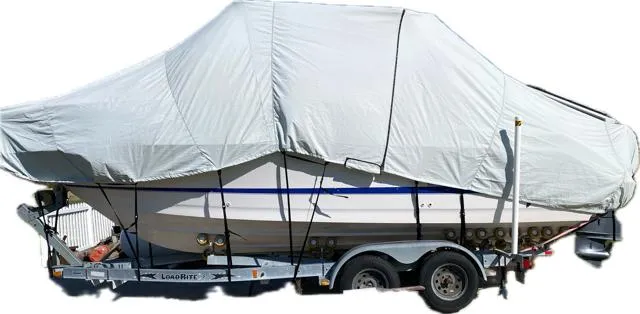 Slide: The Image of 2003 Pro-Line 23 Walk boat covered on a trailer, ready for transport or storage. - 31