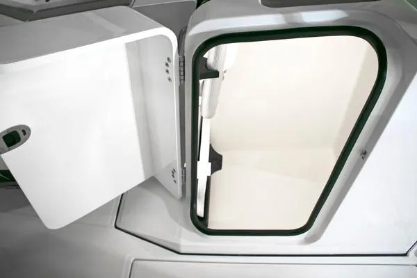 Slide: The Image of 2024 Blackfin 232DC boat storage compartment with open hatch, showcasing interior space. - 47