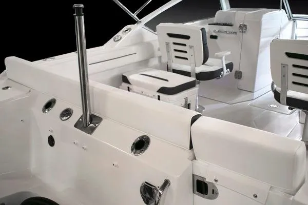 Slide: The Image of 2024 Blackfin 232DC boat interior with white seating and modern design. - 49