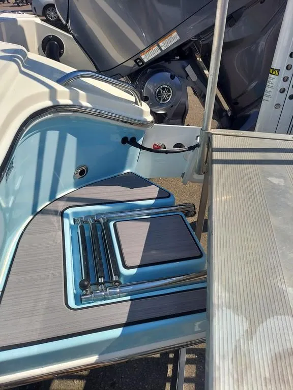Slide: The Image of 2023 Pathfinder 2300 HPS boat with sleek design and modern features. - 10