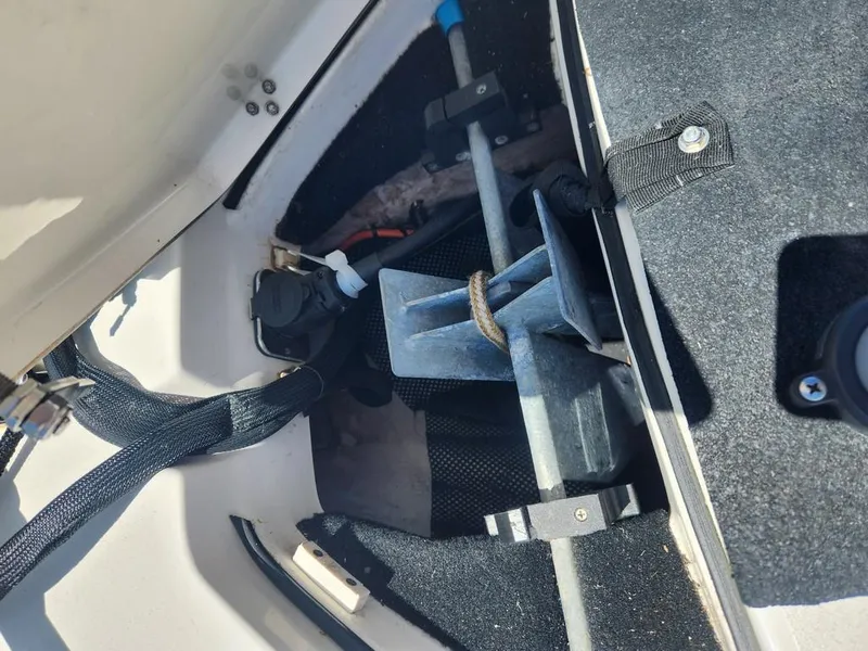 Slide: The Image of Anchor storage compartment in a 2023 Pathfinder 2300 HPS boat. - 29