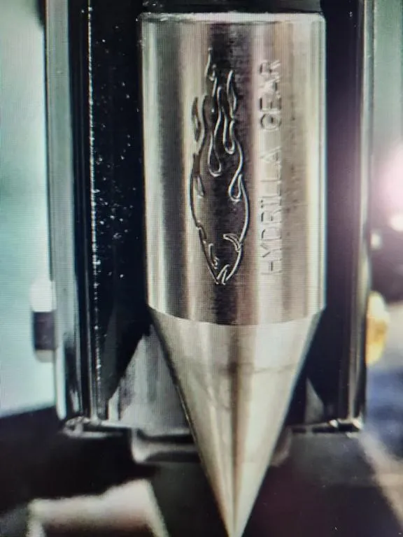 Slide: The Image of Close-up of a metallic component with engraved logo, Pathfinder 2300 HPS, 2023 model. - 44