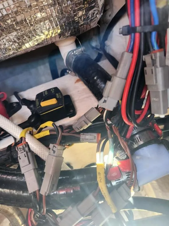 Slide: The Image of Wiring and connectors inside a 2023 Pathfinder 2300 HPS boat. - 45
