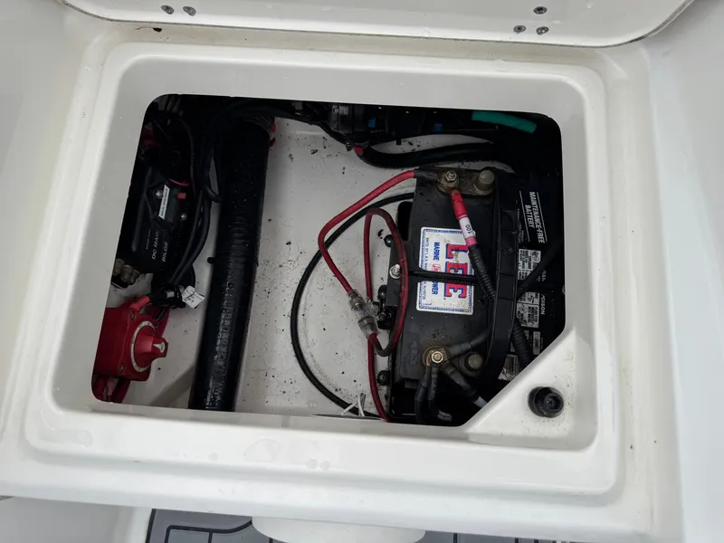 Slide: The Image of Battery compartment of a 2013 Boston Whaler 210 Montauk boat. - 23