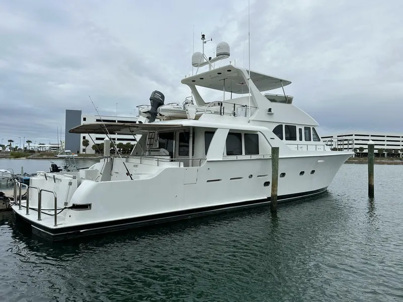 Slide: The Image of 2004 Cheoy Lee 72 yacht docked in marina, overcast sky, side view. - 6