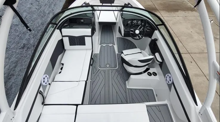 Slide: The Image of 2025 Monterey M-22 boat interior with sleek seating and modern dashboard design. - 8