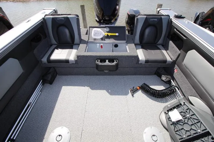Slide: The Image of 2025 Lund 2075 Tyee boat interior with seating and storage compartments. - 10