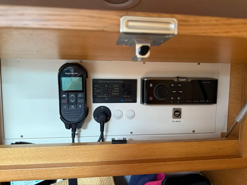 Slide: The Image of Control panel inside 2019 X-Yachts X4⁶, featuring navigation and communication equipment. - 22