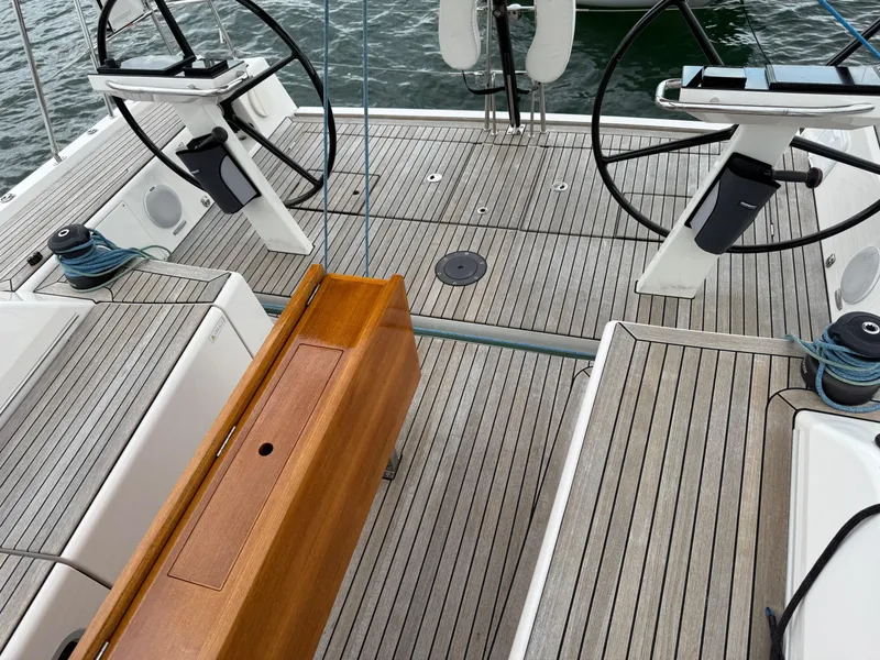 Slide: The Image of Cockpit of 2019 X-Yachts X4⁶ sailboat with dual steering wheels and teak decking. - 8