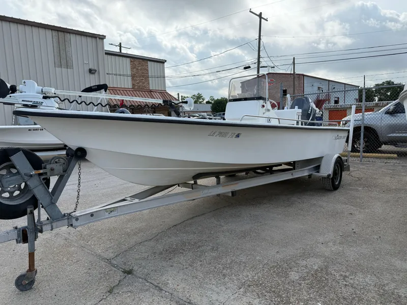 The Image of 2010 Blazer Bay 2170 boat on trailer in outdoor lot. - 1