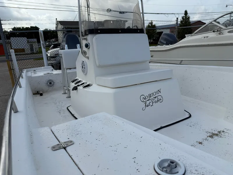 Slide: The Image of 2010 Blazer Bay 2170 boat interior with console and seating. - 8