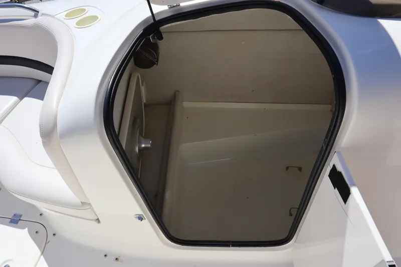 Slide: The Image of 2000 Chaparral Sunesta 232 boat interior storage compartment. - 19