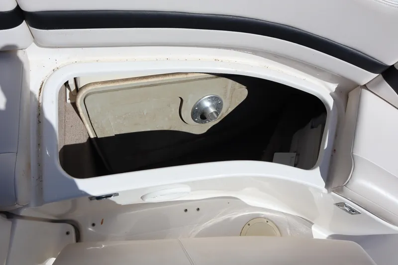 Slide: The Image of Storage compartment in a 2000 Chaparral Sunesta 232 boat interior. - 22