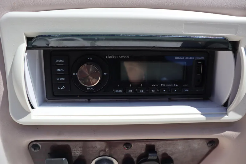 Slide: The Image of Clarion stereo system in 2000 Chaparral Sunesta 232 boat dashboard. - 26
