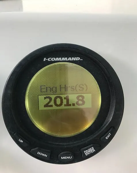 Slide: The Image of I-Command gauge displaying 201.8 engine hours on Ocean Master 29 CC, 2014 model. - 13