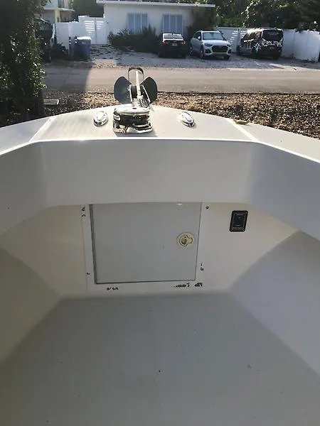 Slide: The Image of 2014 Ocean Master 29 CC boat interior with anchor and storage compartment. - 8