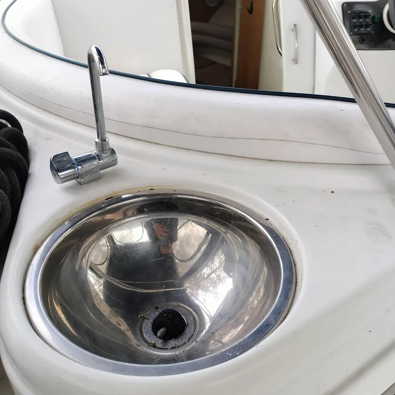 Slide: The Image of Stainless steel sink and faucet on 2001 Chris-Craft 26 Constellation boat. - 13