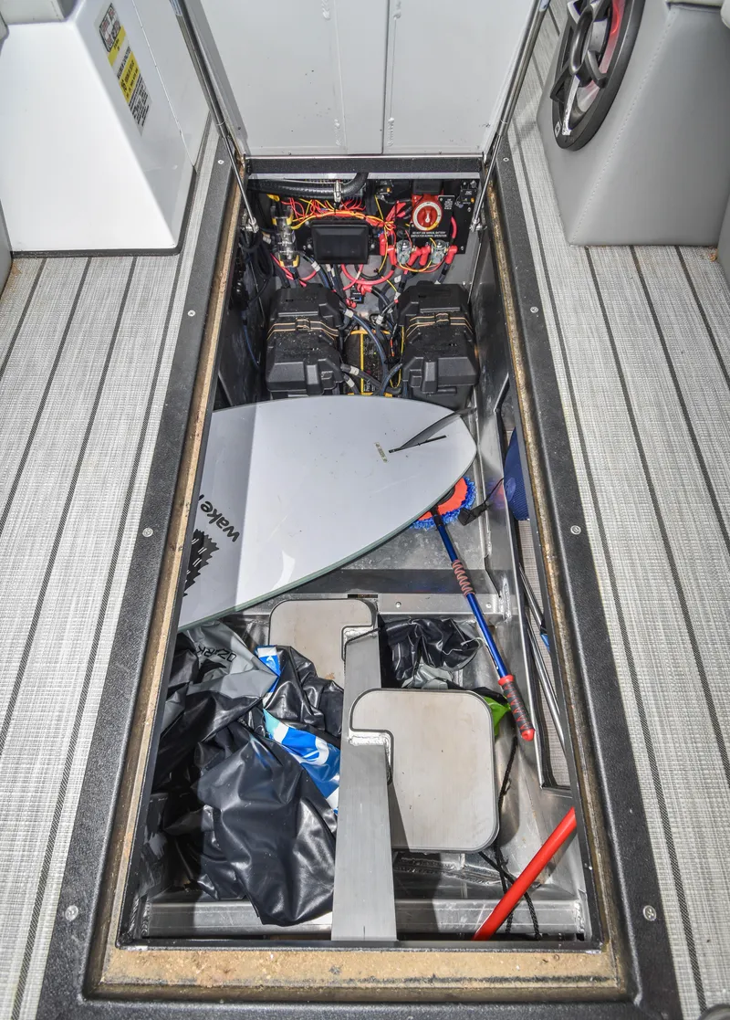Slide: The Image of Storage compartment of 2022 Montara MT 2.0 25 CW boat with equipment and wiring. - 23
