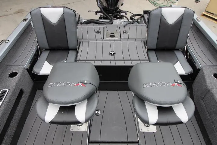 Slide: The Image of 2025 Vexus ADX 200 boat interior with sleek seating and modern design. - 17