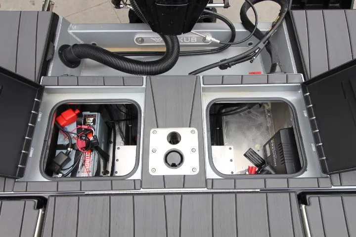 Slide: The Image of 2025 Vexus ADX 200 boat storage compartments with wiring and equipment. - 19