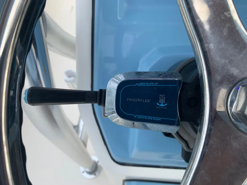 Slide: The Image of 2024 Pathfinder 2400 TRS boat control lever with Fingerflex technology. - 24