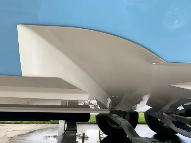 Slide: The Image of 2024 Pathfinder 2400 TRS boat hull on trailer, showcasing sleek design and craftsmanship. - 6