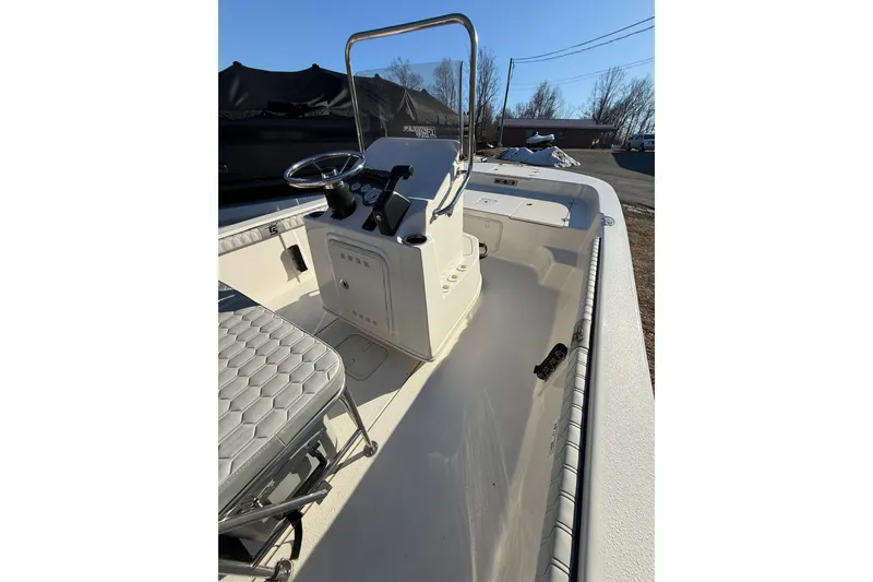 Slide: The Image of 2025 Carolina Skiff 19 LS boat interior with steering console and seating. - 10