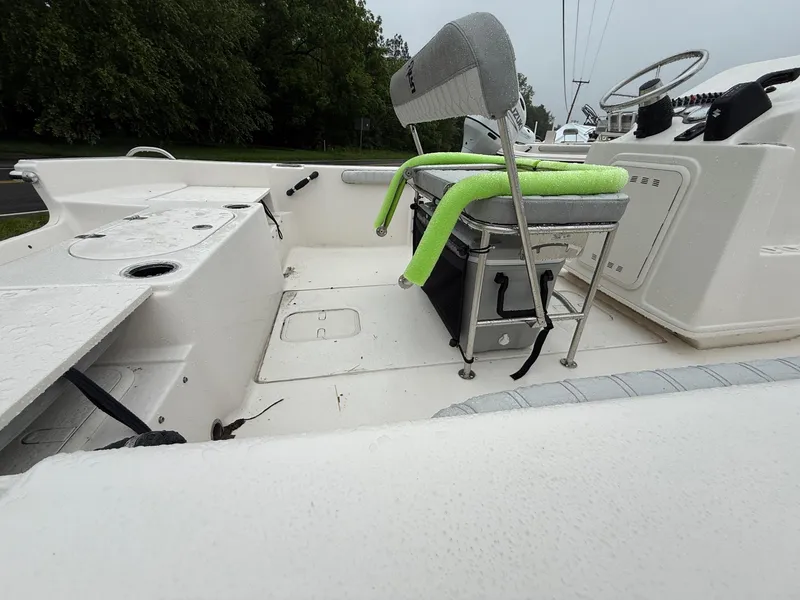 Slide: The Image of 2025 Carolina Skiff 19 LS boat on trailer, parked on grass. - 4